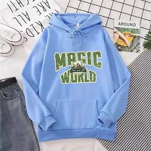 Close-up of light blue hoodie with Magic World graphic print and front pocket details