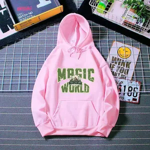 Pink oversized hoodie featuring vintage Magic World print and kangaroo pocket detail