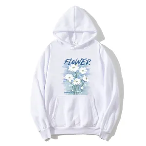 Women's white oversized hoodie featuring a floral daisy print and kangaroo pocket