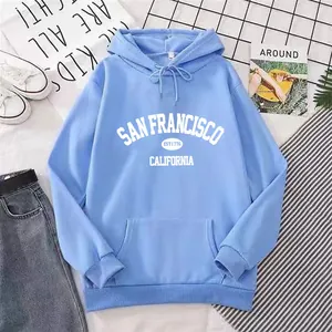 Detailed close-up of sky blue hoodie with San Francisco California print and drawstring hood
