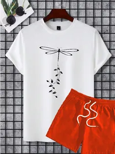 Detail of white cotton t-shirt with dragonfly print and orange shorts with drawstrings