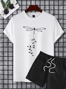 Flat lay of men's white t-shirt with dragonfly print and black drawstring shorts set