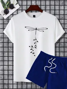 Detail view of white dragonfly print T-shirt and navy shorts set with drawstring