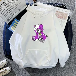 Detail of white oversize hoodie with purple bear print and front kangaroo pocket