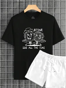 Detail of black T-shirt with cartoon disco ball print and white drawstring casual shorts