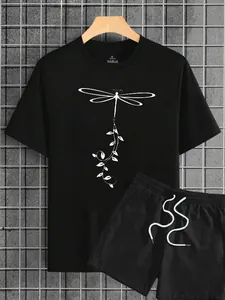 Macro detail of black polyester t-shirt showing dragonfly print and size M inner collar label