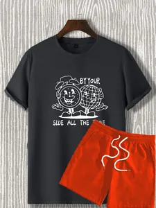 Detail of grey T-shirt with vintage cartoon print and orange shorts with drawstring