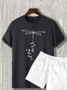 Detail of grey dragonfly print T-shirt and white drawstring shorts summer set