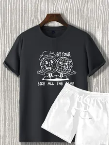 Detail of dark grey t-shirt with retro cartoon graphic and white drawstring shorts