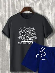 Detail of short sleeve T-shirt and drawstring shorts set with cartoon graphic print
