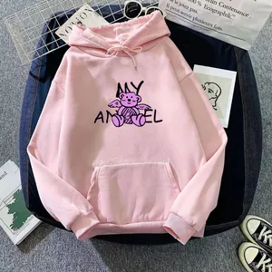 Detail of pink hoodie featuring a purple angel bear print and MY ANGEL typography text