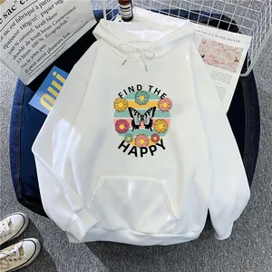 Flat lay of white oversized hoodie with FIND THE HAPPY butterfly print and front pocket