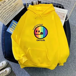 Flat lay of yellow cotton hoodie with rainbow smiley face and kangaroo pocket