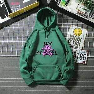 Detail of green oversized hoodie with pink cartoon angel bear and MY ANGEL text