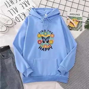 Light blue oversized hoodie with butterfly floral print and Find The Happy slogan design