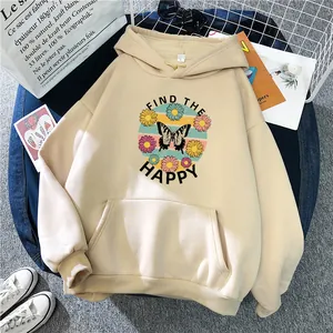 Oversized beige hoodie for women with butterfly and daisy print in a cozy flat lay style