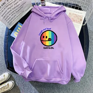 Detailed view of purple hoodie with rainbow smiley face print and kangaroo pocket design