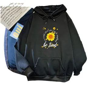 Oversized black fleece hoodie with sunflower print and Be Kind slogan for women