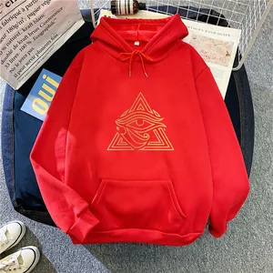 Oversized red hoodie featuring golden Eye of Horus graphic with front kangaroo pocket