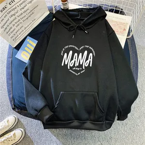 Close-up of black hoodie featuring white MAMA heart print and front kangaroo pocket detail