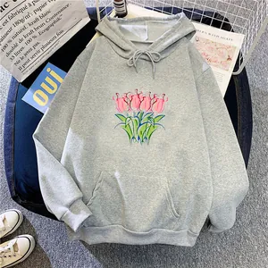 Detail of grey oversized hoodie with pink tulip print and adjustable drawstring hood