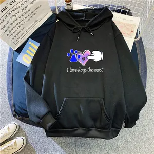 Detail of black hoodie featuring colorful graffiti dog print and kangaroo pocket design