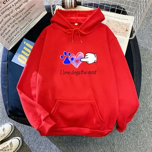 Detail of red drawstring hoodie featuring I love dogs text and cute cartoon dog paw print