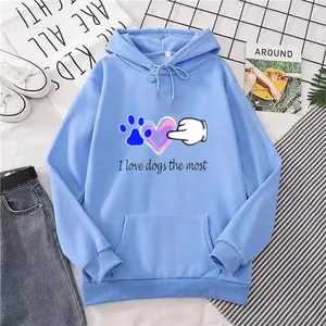 Detailed close-up of light blue hoodie featuring dog paw and heart graphic prints