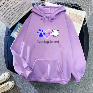 Detail of purple hoodie with dog lover graphics, kangaroo pocket, and casual style