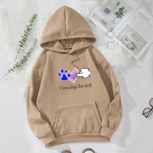 Detail of khaki oversized hoodie featuring a cute dog paw and heart graphic print
