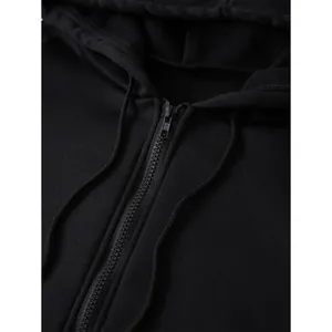Oversized black fleece hoodie with zip closure and adjustable drawstrings for men and women