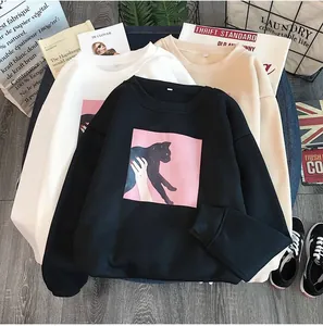 Women's oversized crewneck sweatshirts in black, white, and apricot with cat graphic print