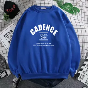 Detailed close-up of blue crewneck sweatshirt with white CADENCE letter print on flat lay