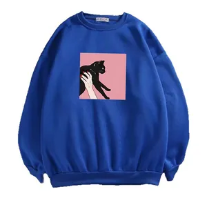 Royal blue crewneck sweatshirt with pink cat graphic print and a loose drop shoulder fit