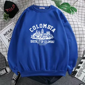 Royal blue crewneck sweatshirt featuring a vintage Columbia graphic and ribbed cuffs