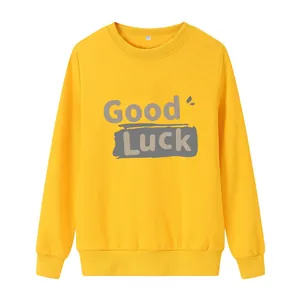 Sweat-shirt jaune à col rond avec imprimé Good Luck et poignets côtelés