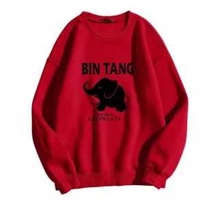 Detail of red crewneck sweatshirt featuring elephant silhouette and black graphic print