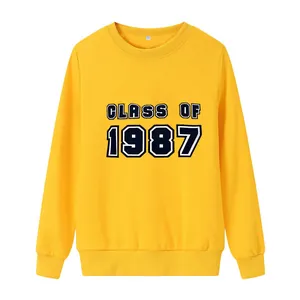 Bright yellow crew neck sweatshirt featuring 'CLASS OF 1987' printed text design