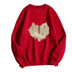 Loose red crewneck sweatshirt with creative heart-shaped tape graphic design