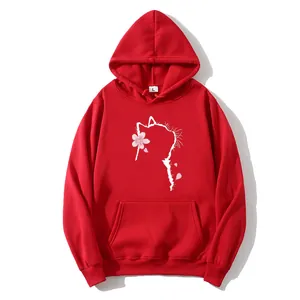 Oversized red hoodie with cat silhouette and cherry blossom print in a flat lay view