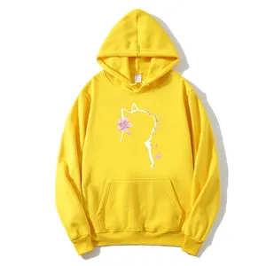 Bright yellow oversized hooded sweatshirt featuring a minimalist white cat and cherry blossom print
