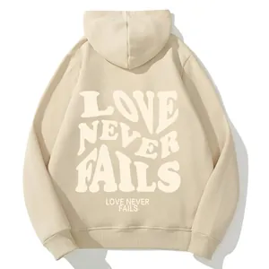 Beige oversized fleece hoodie for women with LOVE NEVER FAILS back print design