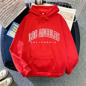 Detail view of red oversized hooded sweatshirt with Los Angeles California print