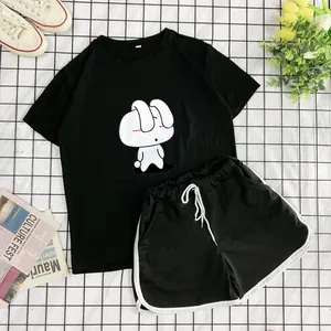 Women's black two-piece casual set featuring a cartoon rabbit print T-shirt and shorts