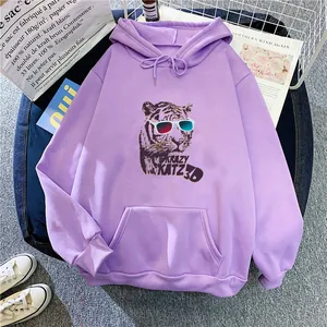Detail of purple oversized hoodie featuring realistic 3D tiger print and front pocket