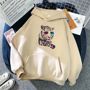 Oversize beige hoodie featuring a 3D tiger print with front kangaroo pocket and ribbed cuffs
