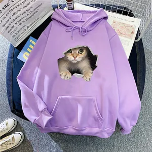 Detail of a purple hoodie featuring a realistic 3D cat print and drawstring hood