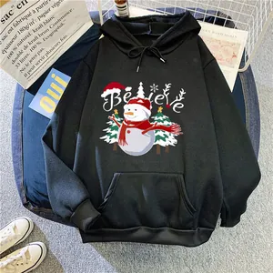 Detail of black hoodie with festive snowman graphic and kangaroo pocket for winter