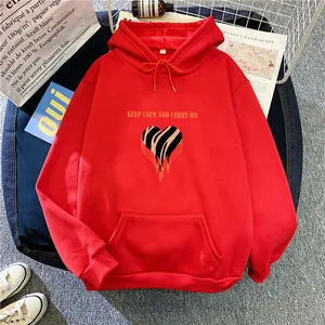 Cozy red oversized hoodie with tiger-print heart and kangaroo pocket for casual wear