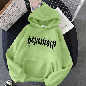 Close-up of light green oversized hoodie featuring black gothic print and kangaroo pocket